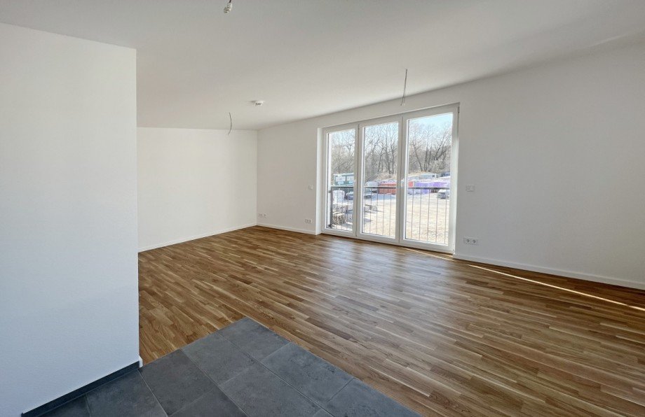 Blick von der offenen K�che in den Wohn/Essbereich Etagenwohnung Zossen